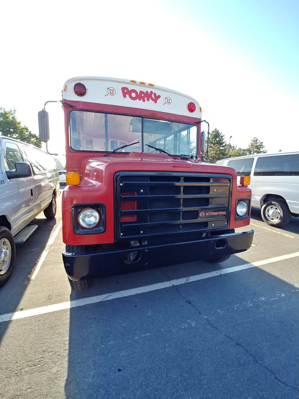 Porky head-on in a parking lot, PORKY across the front